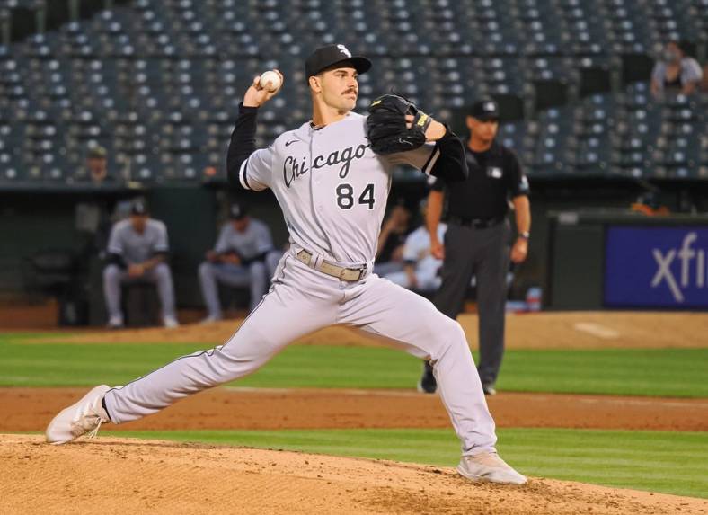 Sep 8, 2022; Oakland, California, USA; Chicago White Sox starting pitcher Dylan Cease (84) throws a pitch against the Oakland Athletics during the second inning at RingCentral Coliseum. Mandatory Credit: Kelley L Cox-USA TODAY Sports