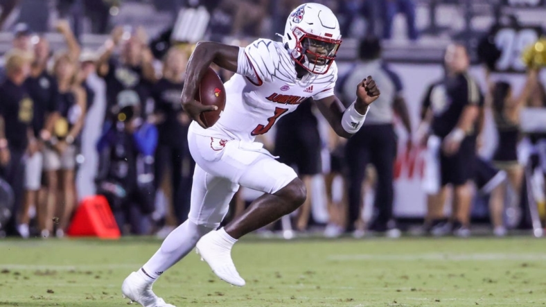 Sep 9, 2022; Orlando, Florida, USA; Louisville Cardinals quarterback Malik Cunningham (3) runs the ball during the first quarter against the UCF Knights at FBC Mortgage Stadium. Mandatory Credit: Mike Watters-USA TODAY Sports