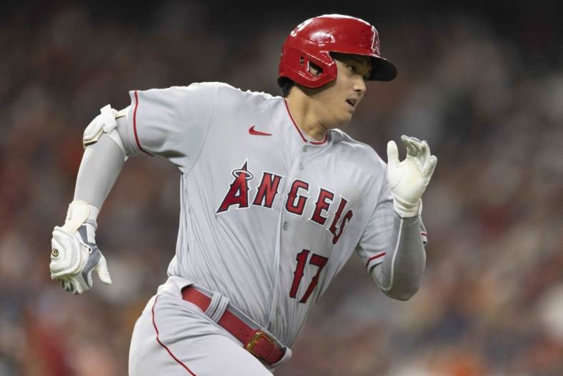 Sep 9, 2022; Houston, Texas, USA; Los Angeles Angels designated hitter Shohei Ohtani (17) hits a double against the Houston Astros in the fourth inning at Minute Maid Park. Mandatory Credit: Thomas Shea-USA TODAY Sports