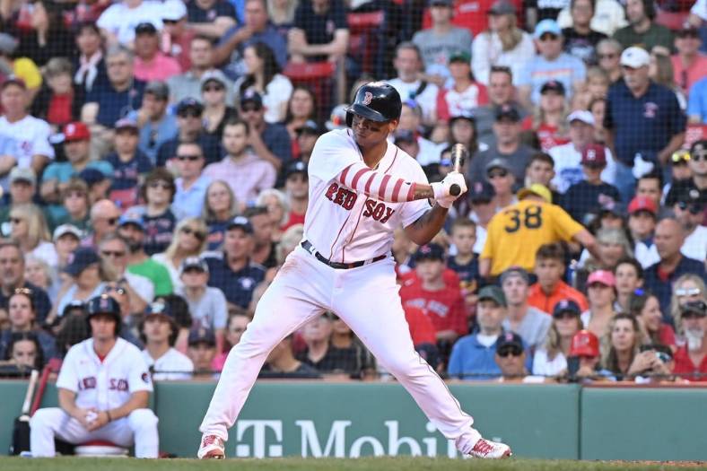 Sep 3, 2022; Boston, Massachusetts, USA; Boston Red Sox third baseman Rafael Devers (11) at bat against the Texas Rangers at Fenway Park. Mandatory Credit: Eric Canha-USA TODAY Sports