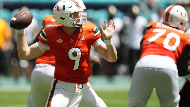 Sep 10, 2022; Miami Gardens, Florida, USA; Miami Hurricanes quarterback Tyler Van Dyke (9) attempts a pass against the Southern Miss Golden Eagles during the first half at Hard Rock Stadium. Mandatory Credit: Jasen Vinlove-USA TODAY Sports