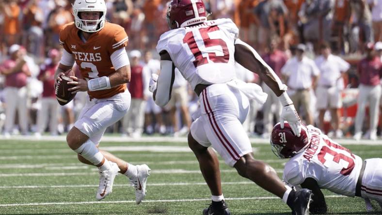 Sep 10, 2022; Austin, Texas, USA; Texas Longhorns quarterback Quinn Ewers (3) looks to pass before getting hit by Alabama Crimson Tide linebacker Dallas Turner (15) during the first half at at Darrell K Royal-Texas Memorial Stadium. Mandatory Credit: Scott Wachter-USA TODAY Sports