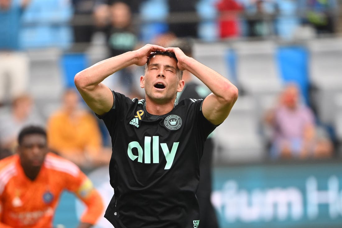 Sep 10, 2022; Charlotte, North Carolina, USA; Charlotte FC midfielder Brandt Bronico (13) reacts after missing a goal in the first half at Bank of America Stadium. Mandatory Credit: Bob Donnan-USA TODAY Sports