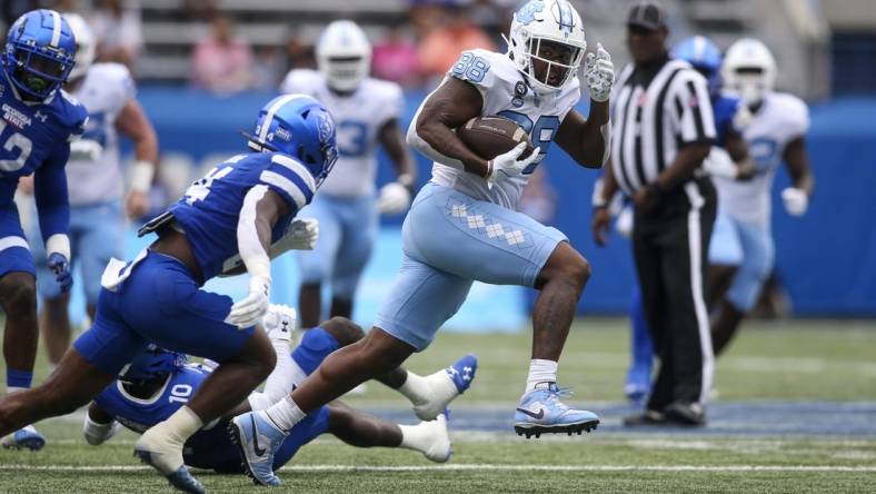 Sep 10, 2022; Atlanta, Georgia, USA; North Carolina Tar Heels tight end Kamari Morales (88) runs for a touchdown after a catch against the Georgia State Panthers in the first half at Center Parc Stadium. Mandatory Credit: Brett Davis-USA TODAY Sports