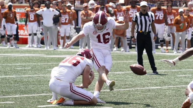 Sep 10, 2022; Austin, Texas, USA; Alabama Crimson Tide kicker Will Reichard (16) kicks the game winning field goal at the end of the second half against the Texas Longhorns at Darrell K Royal-Texas Memorial Stadium. Mandatory Credit: Scott Wachter-USA TODAY Sports