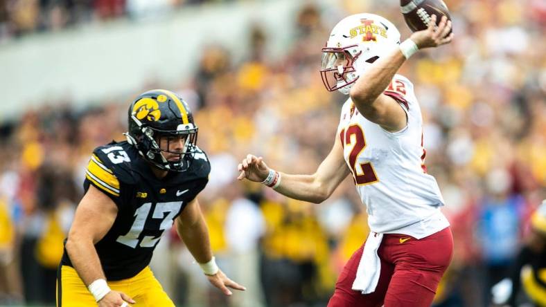 Iowa defensive end Joe Evans (13) pressures Iowa State quarterback Hunter Dekkers (12) during a NCAA football game, Saturday, Sept. 10, 2022, at Kinnick Stadium in Iowa City, Iowa.

220910 Isu Iowa Fb 052 Jpg