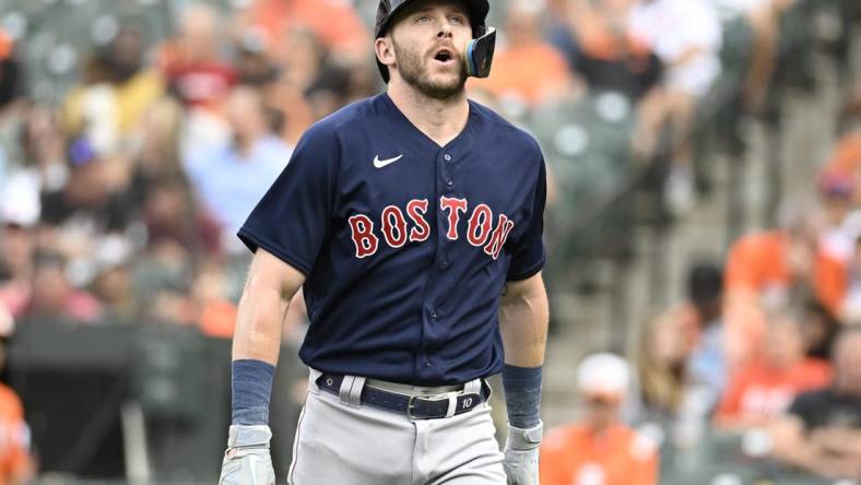 Sep 10, 2022; Baltimore, Maryland, USA;  Boston Red Sox second baseman Trevor Story (10) reacts to being hit by a pitch during the first inning against the Baltimore Orioles at Oriole Park at Camden Yards. Mandatory Credit: James A. Pittman-USA TODAY Sports