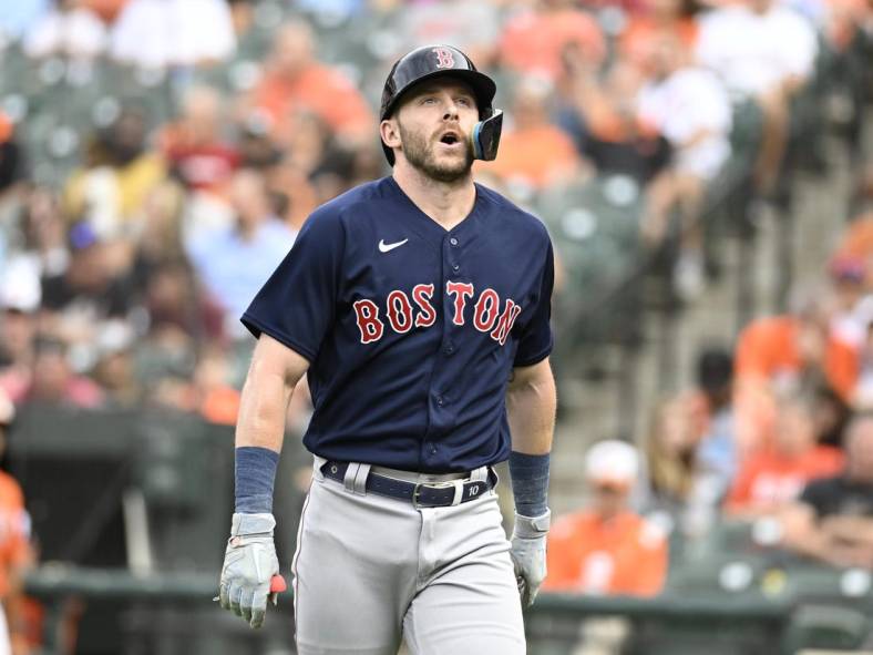 Sep 10, 2022; Baltimore, Maryland, USA;  Boston Red Sox second baseman Trevor Story (10) reacts to being hit by a pitch during the first inning against the Baltimore Orioles at Oriole Park at Camden Yards. Mandatory Credit: James A. Pittman-USA TODAY Sports
