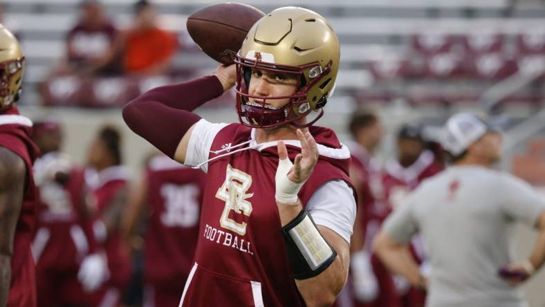 Sep 10, 2022; Blacksburg, Virginia, USA;  Boston College Eagles quarterback Phil Jurkovec (5) throws the ball before the game against the Virginia Tech Hokies at Lane Stadium. Mandatory Credit: Reinhold Matay-USA TODAY Sports