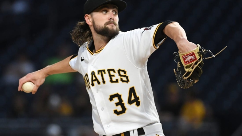 Sep 10, 2022; Pittsburgh, Pennsylvania, USA;  Pittsburgh Pirates starting pitcher JT Brubaker (34) delivers the ball against the St. Louis Cardinals in the first inning at PNC Park. Mandatory Credit: Philip G. Pavely-USA TODAY Sports