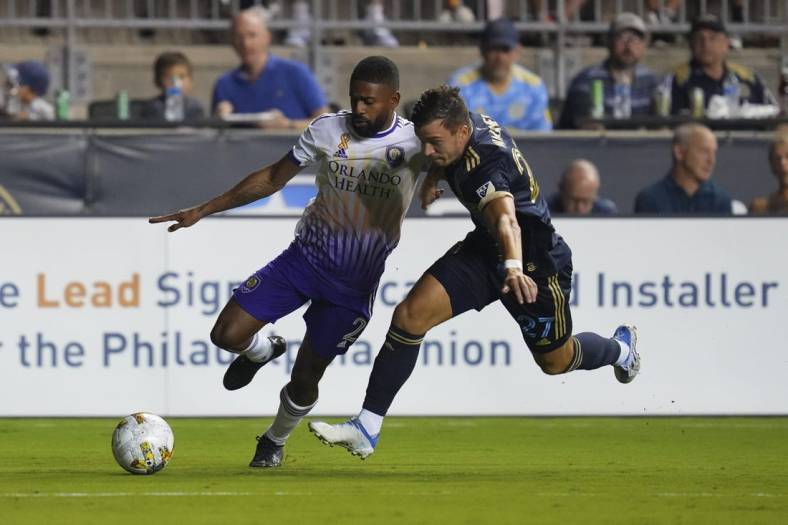 Sep 10, 2022; Chester, Pennsylvania, USA; Orlando City defender Ruan (2) controls the ball against Philadelphia Union defender Kai Wagner (27) in the first half at Subaru Park. Mandatory Credit: Mitchell Leff-USA TODAY Sports