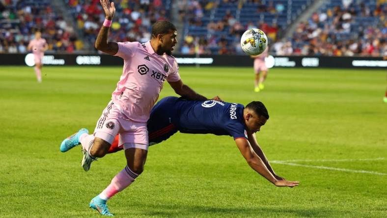 Sep 10, 2022; Chicago, Illinois, USA; Inter Miami defender DeAndre Yedlin (2) goes for a loose ball against Chicago Fire defender Miguel Angel Navarro (6) during the first half at Bridgeview Stadium. Mandatory Credit: Mike Dinovo-USA TODAY Sports