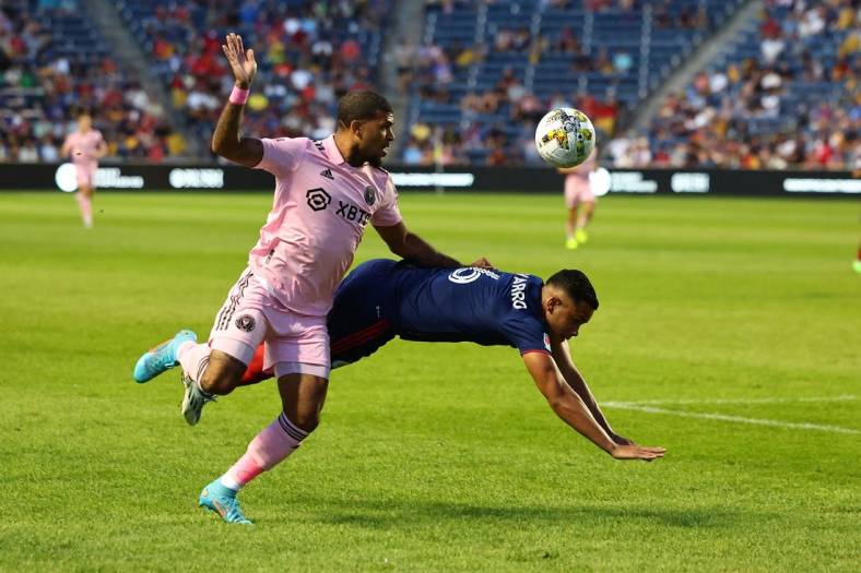 Sep 10, 2022; Chicago, Illinois, USA; Inter Miami defender DeAndre Yedlin (2) goes for a loose ball against Chicago Fire defender Miguel Angel Navarro (6) during the first half at Bridgeview Stadium. Mandatory Credit: Mike Dinovo-USA TODAY Sports