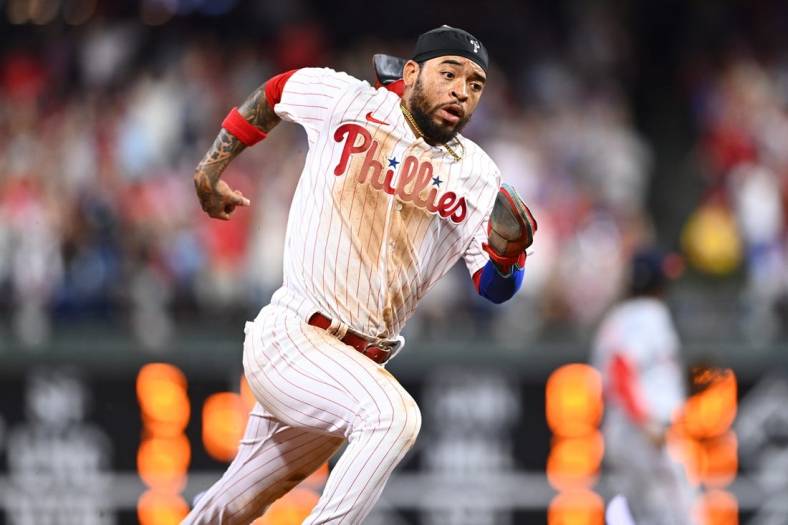 Sep 10, 2022; Philadelphia, Pennsylvania, USA; Philadelphia Phillies infielder Edmundo Sosa (33) rounds third to advance home and score against the Washington Nationals in the fourth inning at Citizens Bank Park. Mandatory Credit: Kyle Ross-USA TODAY Sports