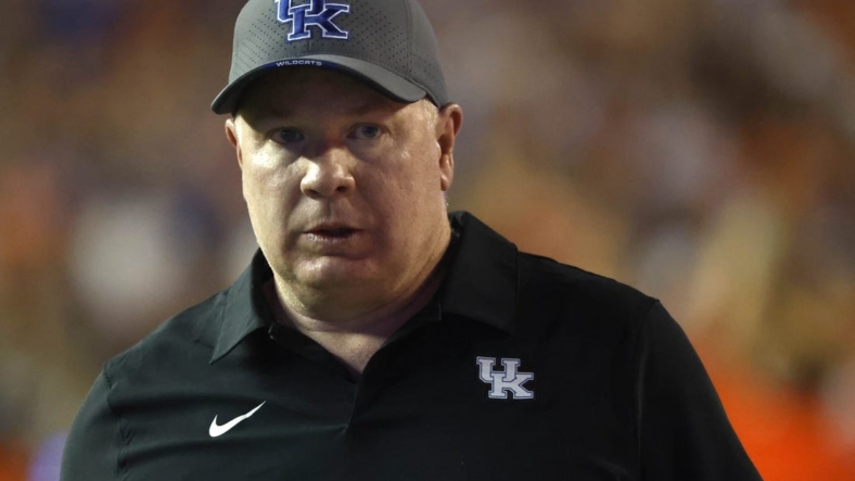 Sep 10, 2022; Gainesville, Florida, USA; Kentucky Wildcats head coach Mark Stoops looks on during the second half against the Florida Gators at Ben Hill Griffin Stadium. Mandatory Credit: Kim Klement-USA TODAY Sports