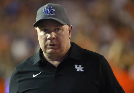 Sep 10, 2022; Gainesville, Florida, USA; Kentucky Wildcats head coach Mark Stoops looks on during the second half against the Florida Gators at Ben Hill Griffin Stadium. Mandatory Credit: Kim Klement-USA TODAY Sports
