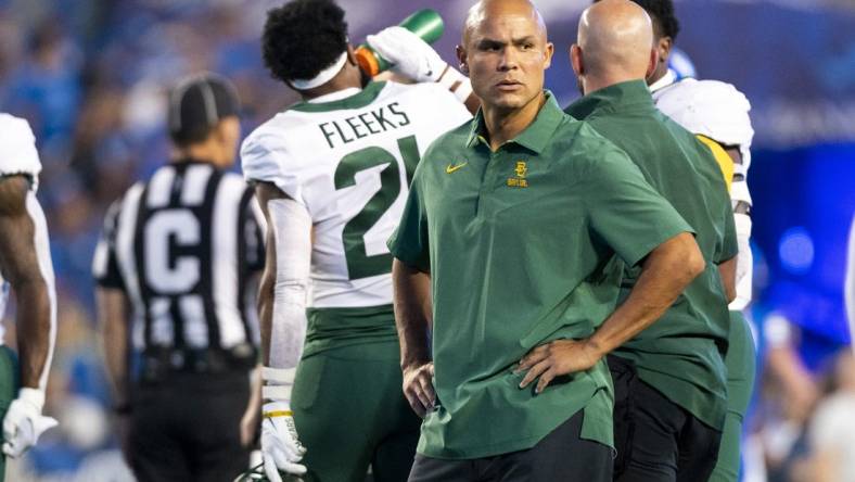 Sep 10, 2022; Provo, Utah, USA; Baylor Bears head coach Dave Aranda supervises warmups as Baylor before a game against the Brigham Young Cougars at LaVell Edwards Stadium. Mandatory Credit: Gabriel Mayberry-USA TODAY Sports