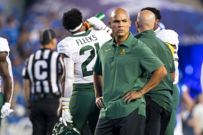 Sep 10, 2022; Provo, Utah, USA; Baylor Bears head coach Dave Aranda supervises warmups as Baylor before a game against the Brigham Young Cougars at LaVell Edwards Stadium. Mandatory Credit: Gabriel Mayberry-USA TODAY Sports