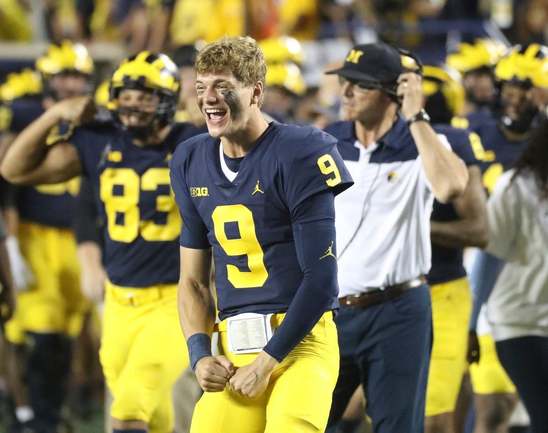 Michigan quarterback J.J. McCarthy celebrates on the sidelines during the second half of the 56-10 win over Hawaii on Saturday, Sept. 10, 2022, in Ann Arbor.

Mich2