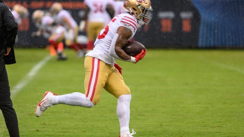 Sep 11, 2022; Chicago, Illinois, USA; San Francisco 49ers running back Elijah Mitchell (25) warms up before the game against the Chicago Bears at Soldier Field. Mandatory Credit: Daniel Bartel-USA TODAY Sports