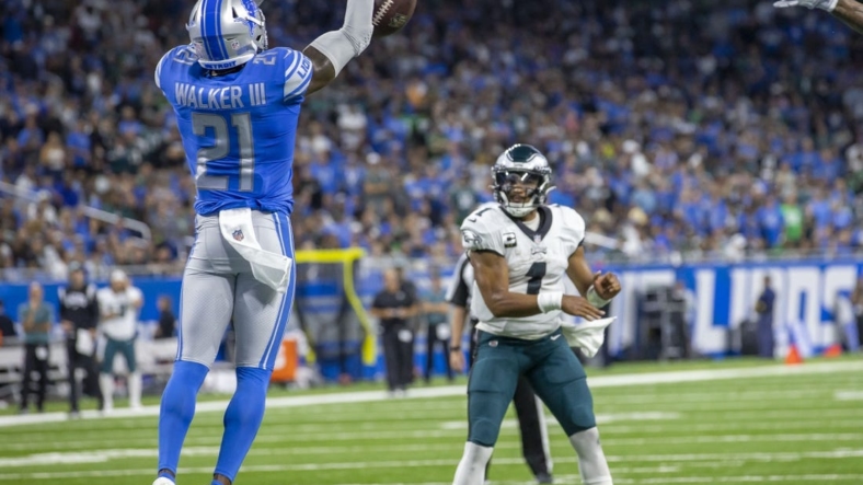 Sep 11, 2022; Detroit, Michigan, USA; Detroit Lions safety Tracy Walker III (21) blocks a pass attempt by Philadelphia Eagles quarterback Jalen Hurts (1) in the second quarter at Ford Field. Mandatory Credit: David Reginek-USA TODAY Sports