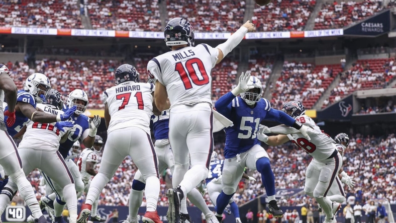 Sep 11, 2022; Houston, Texas, USA; Indianapolis Colts defensive end Kwity Paye (51) applies defensive pressure as Houston Texans quarterback Davis Mills (10) attempts a pass during the second quarter at NRG Stadium. Mandatory Credit: Troy Taormina-USA TODAY Sports
