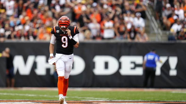 Sep 11, 2022; Cincinnati, Ohio, USA; Cincinnati Bengals quarterback Joe Burrow (9) walks between plays during the fourth quarter of a Week 1 NFL football game against the Pittsburgh Steelers at Paycor Stadium. Mandatory Credit: Sam Greene-USA TODAY Sports