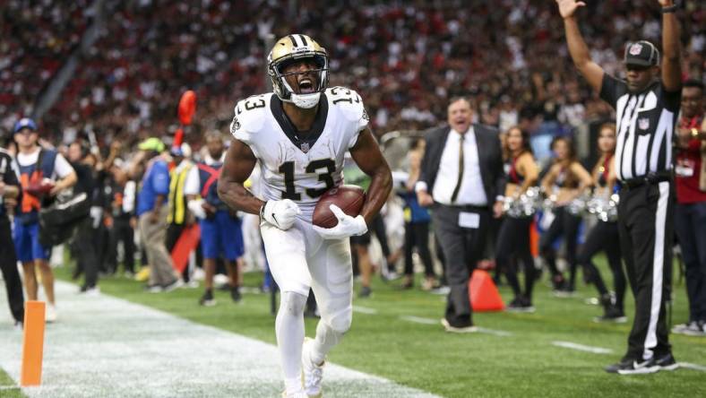 Sep 11, 2022; Atlanta, Georgia, USA; New Orleans Saints wide receiver Michael Thomas (13) celebrates after a touchdown against the Atlanta Falcons in the fourth quarter at Mercedes-Benz Stadium. Mandatory Credit: Brett Davis-USA TODAY Sports