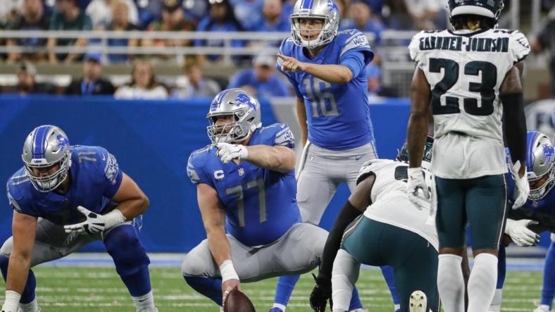 Sep 11, 2022; Detroit, Michigan, USA;  Detroit Lions quarterback Jared Goff (16) talks to center Frank Ragnow (77) against Philadelphia Eagles during the second half at Ford Field. Mandatory Credit: Junfu Han-USA TODAY Sports