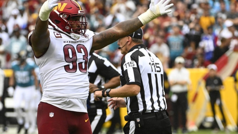 Sep 11, 2022; Landover, Maryland, USA; Washington Commanders defensive tackle Jonathan Allen (93) reacts after a sack against the Jacksonville Jaguars during the first half at FedExField. Mandatory Credit: Brad Mills-USA TODAY Sports