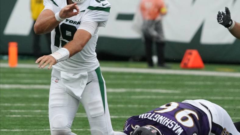 Quarterback, Joe Flacco of the Jets gets the ball off as he is caught by Broderick Washington of the Ravens in the second half in the season opener as the Baltimore Ravens defeated the NY Jets 24-9 on September 11, 2022.

The Baltimore Ravens Defeat The Ny Jets In The Seaqson Opener 24 9 On September 11 2022