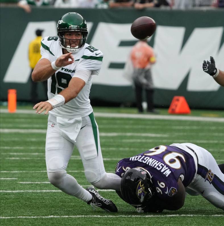 Quarterback, Joe Flacco of the Jets gets the ball off as he is caught by Broderick Washington of the Ravens in the second half in the season opener as the Baltimore Ravens defeated the NY Jets 24-9 on September 11, 2022.

The Baltimore Ravens Defeat The Ny Jets In The Seaqson Opener 24 9 On September 11 2022