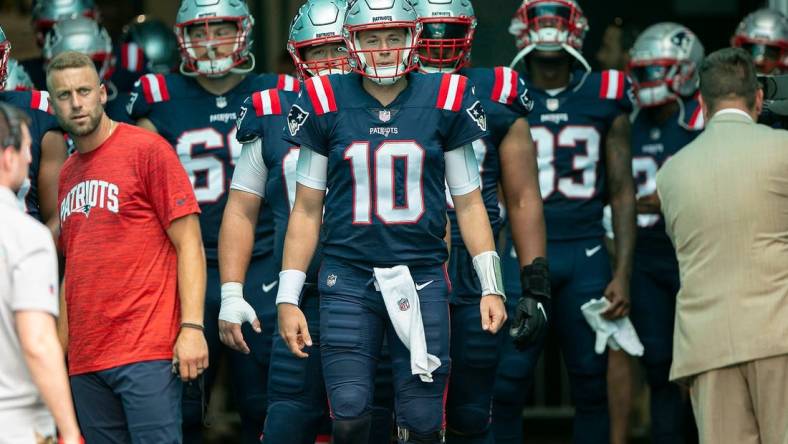 New England Patriots quarterback Mac Jones (10), before the start of their game agains the Miami Dolphins during NFL game Sept 11, 2022, at Hard Rock Stadium in Miami Gardens.

Dolphins V Patriots Nfl Game 04