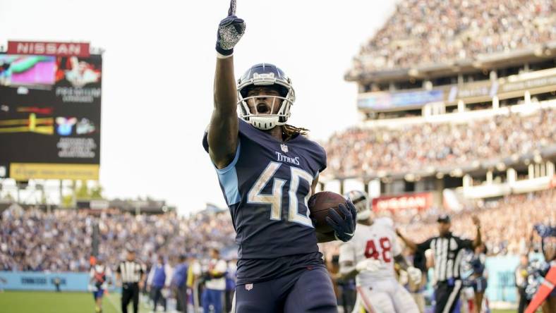 Sep 11, 2022; Nashville, Tennessee, USA; Tennessee Titans running back Dontrell Hilliard (40) scores a touchdown during the third quarter at Nissan Stadium. Mandatory Credit: Andrew Nelles-USA TODAY Sports