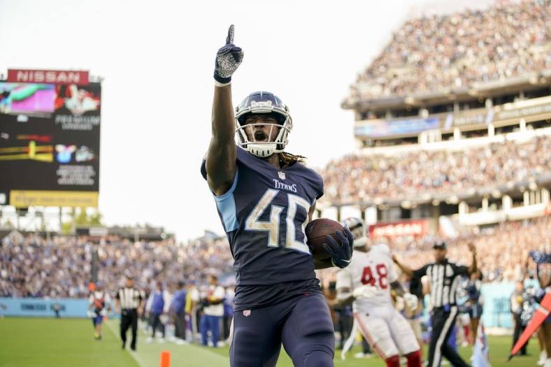 Sep 11, 2022; Nashville, Tennessee, USA; Tennessee Titans running back Dontrell Hilliard (40) scores a touchdown during the third quarter at Nissan Stadium. Mandatory Credit: Andrew Nelles-USA TODAY Sports