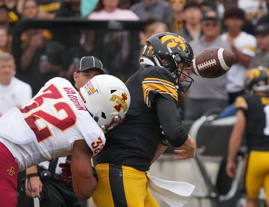 Iowa State linebacker Gerry Vaughn forces Iowa quarterback Spencer Petras to lose the ball during the Cy-Hawk Series football game on Saturday, Sept. 10, 2022, at Kinnick Stadium in Iowa City.

Cyhawkfootball 20220910 Bh