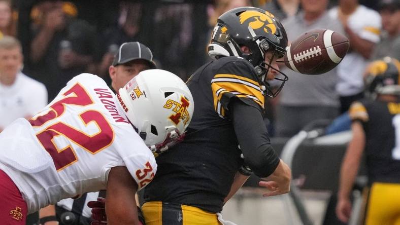 Iowa State linebacker Gerry Vaughn forces Iowa quarterback Spencer Petras to lose the ball during the Cy-Hawk Series football game on Saturday, Sept. 10, 2022, at Kinnick Stadium in Iowa City.

Cyhawkfootball 20220910 Bh