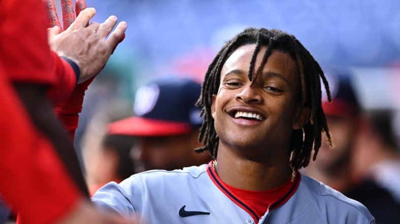 Sep 11, 2022; Philadelphia, Pennsylvania, USA; Washington Nationals infielder CJ Abrams (5) celebrates with teammates after scoring against the Philadelphia Phillies in the fourth inning at Citizens Bank Park. Mandatory Credit: Kyle Ross-USA TODAY Sports