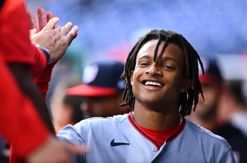 Sep 11, 2022; Philadelphia, Pennsylvania, USA; Washington Nationals infielder CJ Abrams (5) celebrates with teammates after scoring against the Philadelphia Phillies in the fourth inning at Citizens Bank Park. Mandatory Credit: Kyle Ross-USA TODAY Sports