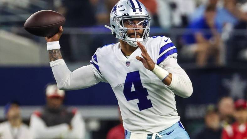 Sep 11, 2022; Arlington, Texas, USA;  Dallas Cowboys quarterback Dak Prescott (4) throws during the first quarter against the Tampa Bay Buccaneers at AT&T Stadium. Mandatory Credit: Kevin Jairaj-USA TODAY Sports