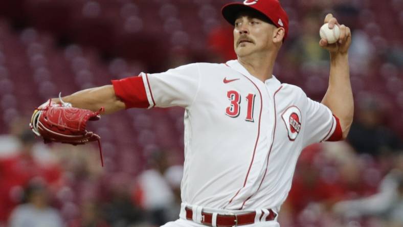 Sep 12, 2022; Cincinnati, Ohio, USA; Cincinnati Reds starting pitcher Mike Minor (31) throws a pitch against the Pittsburgh Pirates during the first inning at Great American Ball Park. Mandatory Credit: David Kohl-USA TODAY Sports