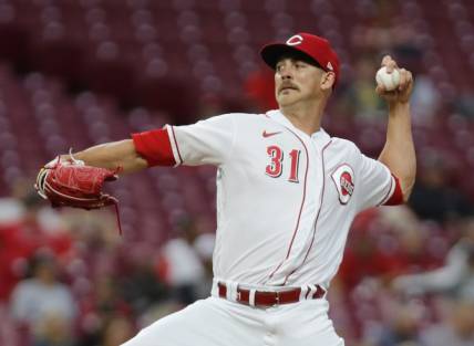 Sep 12, 2022; Cincinnati, Ohio, USA; Cincinnati Reds starting pitcher Mike Minor (31) throws a pitch against the Pittsburgh Pirates during the first inning at Great American Ball Park. Mandatory Credit: David Kohl-USA TODAY Sports