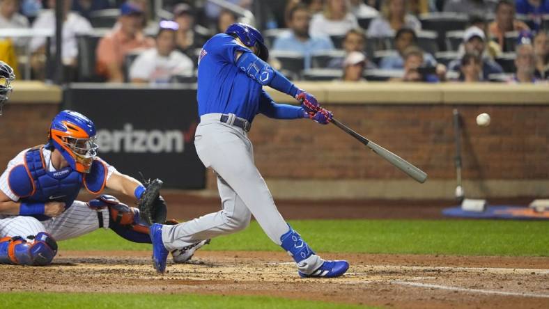 Sep 12, 2022; New York City, New York, USA; Chicago Cubs second baseman Zach McKinstry (6) hits a two run home run against the New York Mets during the third inning at Citi Field. Mandatory Credit: Gregory Fisher-USA TODAY Sports