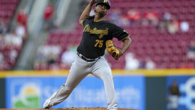 Sep 13, 2022; Cincinnati, Ohio, USA; Pittsburgh Pirates starting pitcher Luis Ortiz (75) pitches against the Cincinnati Reds in the first inning at Great American Ball Park. Mandatory Credit: Katie Stratman-USA TODAY Sports