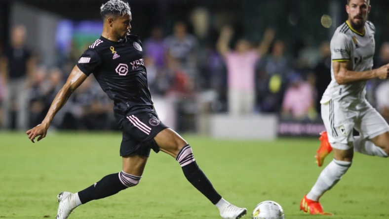 Sep 13, 2022; Fort Lauderdale, Florida, USA; Inter Miami CF forward Ariel Lassiter (11) passes the ball to assist forward Gonzalo Higuain (not pictured) during the first half against Columbus Crew at DRV PNK Stadium. Mandatory Credit: Sam Navarro-USA TODAY Sports