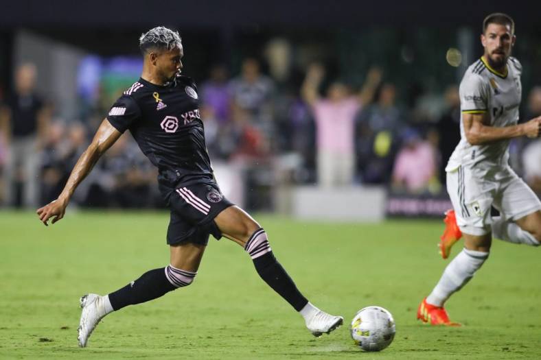 Sep 13, 2022; Fort Lauderdale, Florida, USA; Inter Miami CF forward Ariel Lassiter (11) passes the ball to assist forward Gonzalo Higuain (not pictured) during the first half against Columbus Crew at DRV PNK Stadium. Mandatory Credit: Sam Navarro-USA TODAY Sports
