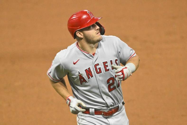 Sep 13, 2022; Cleveland, Ohio, USA; Los Angeles Angels center fielder Mike Trout (27) reacts after flying out in the eighth inning against the Cleveland Guardians at Progressive Field. Mandatory Credit: David Richard-USA TODAY Sports