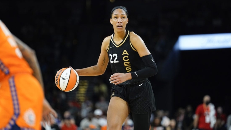 Sep 13, 2022; Las Vegas, Nevada, USA; Las Vegas Aces forward A'ja Wilson (22) controls the ball against the Connecticut Sun during the second quarter in game two of the 2022 WNBA Finals at Michelob Ultra Arena. Mandatory Credit: Lucas Peltier-USA TODAY Sports