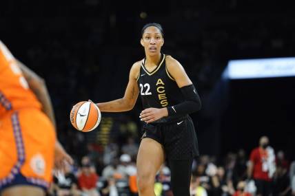 Sep 13, 2022; Las Vegas, Nevada, USA; Las Vegas Aces forward A'ja Wilson (22) controls the ball against the Connecticut Sun during the second quarter in game two of the 2022 WNBA Finals at Michelob Ultra Arena. Mandatory Credit: Lucas Peltier-USA TODAY Sports