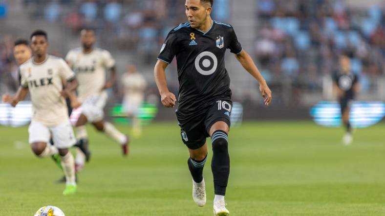 Sep 13, 2022; Saint Paul, Minnesota, USA; Minnesota United midfielder Emanuel Reynoso (10) follows the ball in the first half against Los Angeles FC at Allianz Field. Mandatory Credit: Matt Blewett-USA TODAY Sports